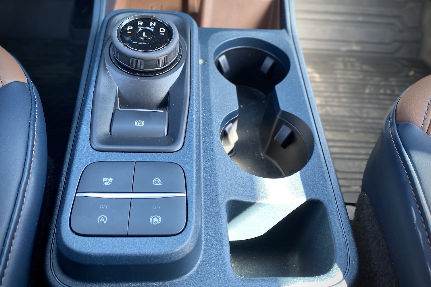Close up of 2022 Ford Maverick center console button and shift dial.