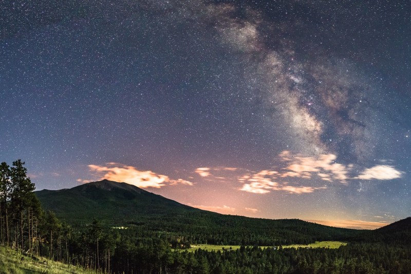 Nighttime view of the San Francisco Peaks from the northwest on the rim of Walker Lake crater, located north of the junction of Hart Prairie Road and FR 418. Humphreys Peak, the highest point in Arizona at 12, 633 feet in elevation, is the foremost peak in view