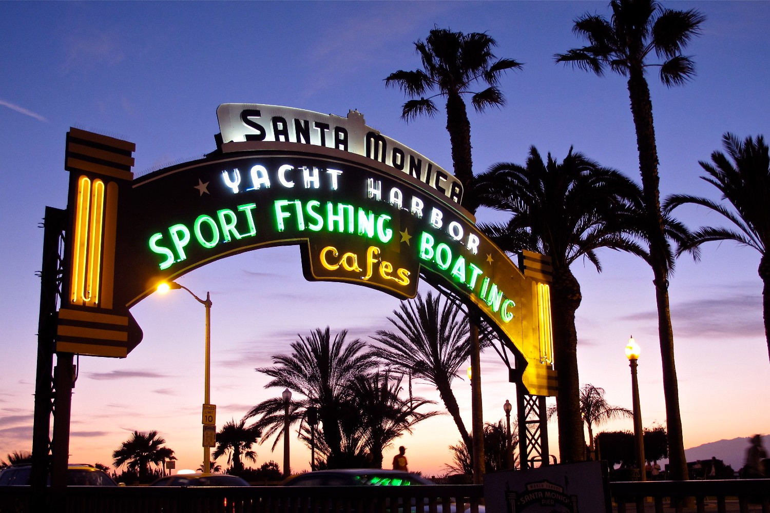 The entrance to the world-famous Santa Monica Pier after sunset.