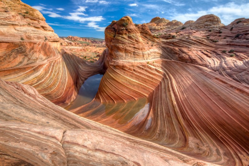 Located on the Colorado Plateau in northern Arizona, Vermilion Cliffs National Monument includes the Paria Canyon-Vermilion Cliffs Wilderness. Nationally known for its beauty, the Paria Canyon has towering walls streaked with desert varnish, huge red rock amphitheaters, sandstone arches, wooded terraces and hanging gardens