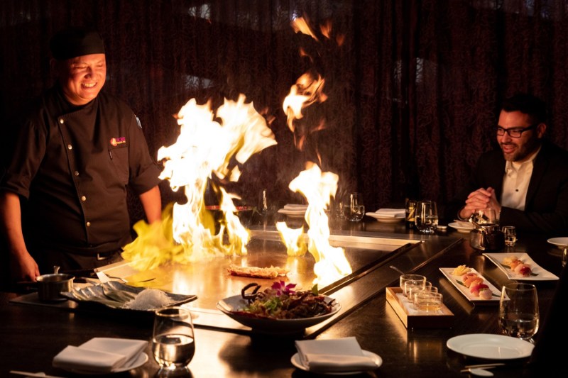 A chef cooks at a Teppan table at Nobu Las Vegas