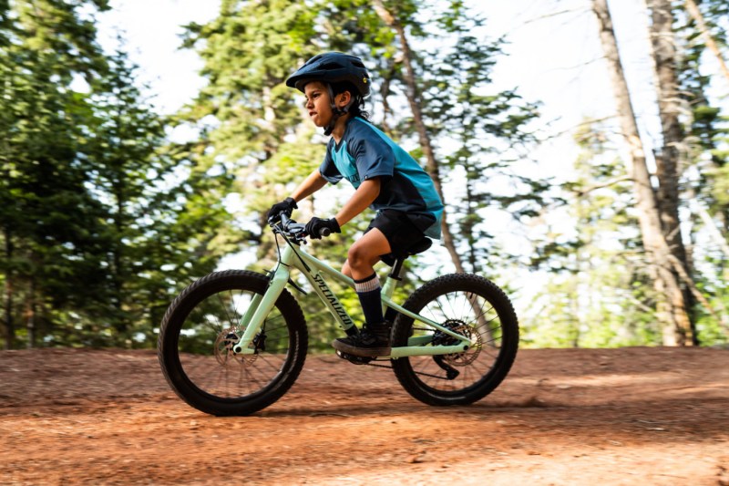 A kid riding a Specialized Riprock bike