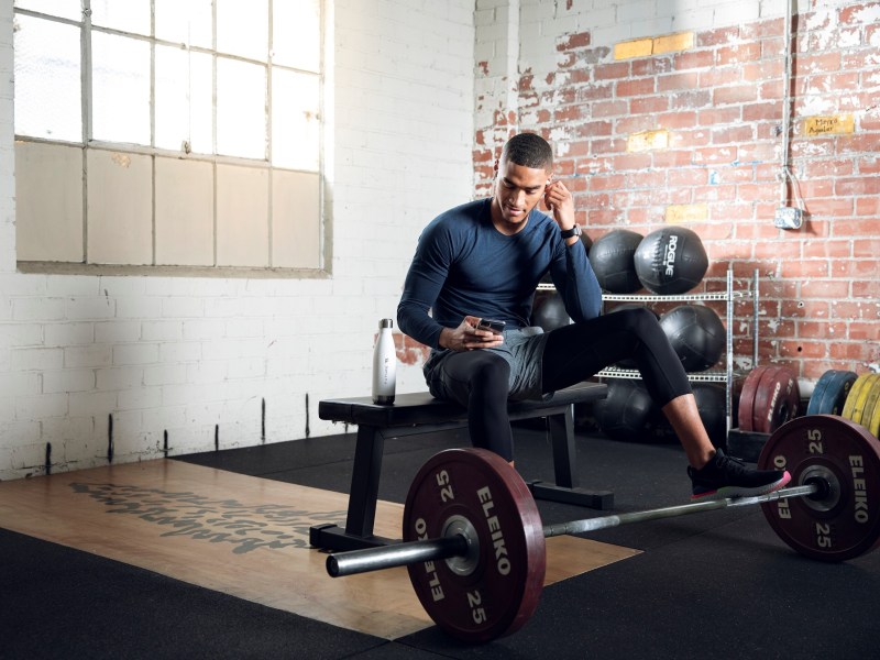 Man working out with Future personal fitness app.
