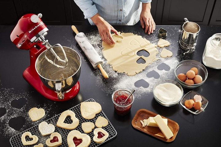 Chef using KitchenAid Stand Mixer to make heart-shaped cookies