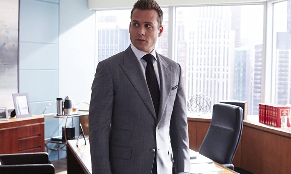 Gabriel Macht wearing a light gray suit