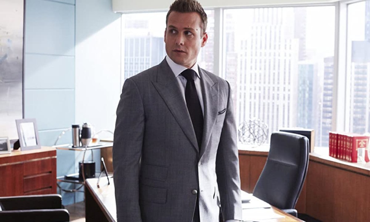 Gabriel Macht wearing a light gray suit