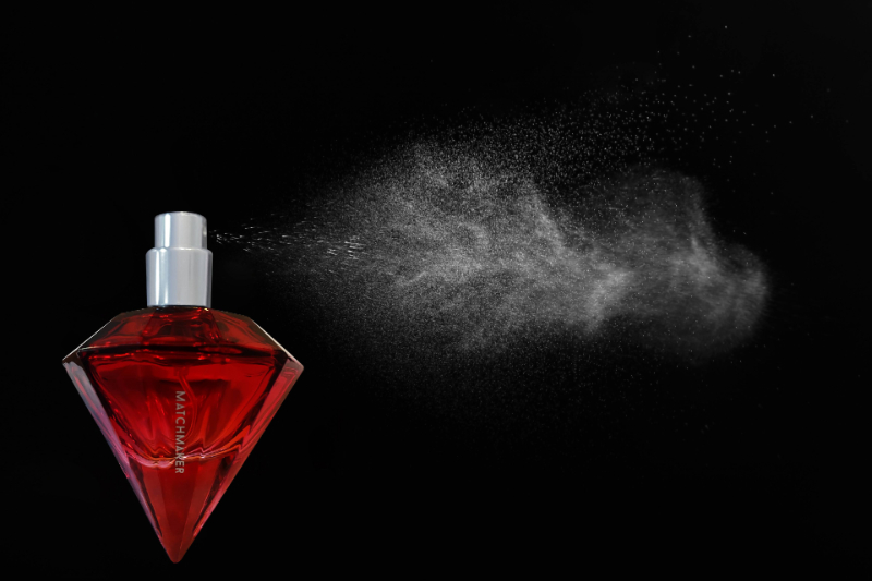 Fragrance being sprayed into the air.