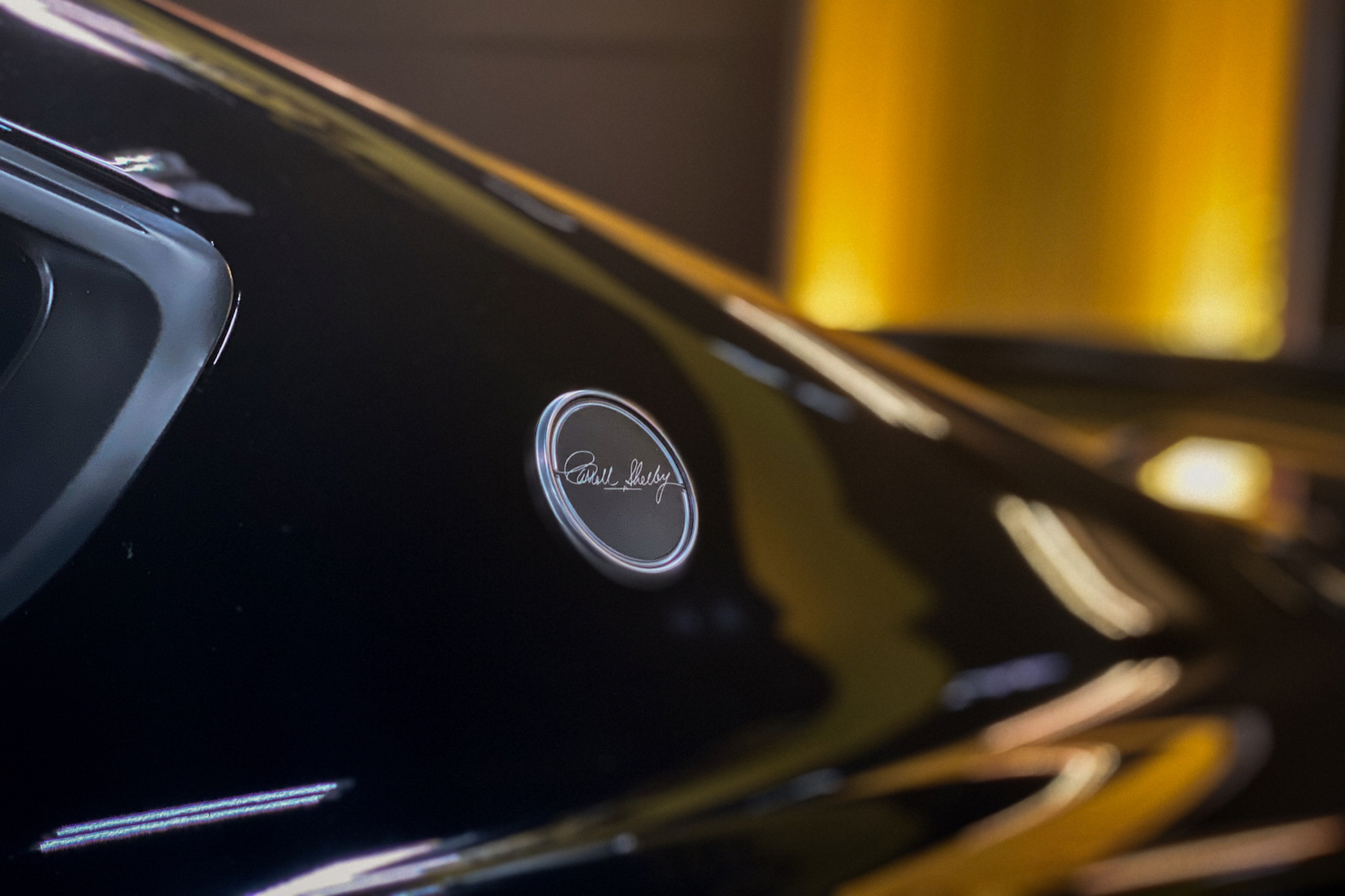 Close up of 2022 Shelby GT500-H Carroll Shelby badge on rear end.