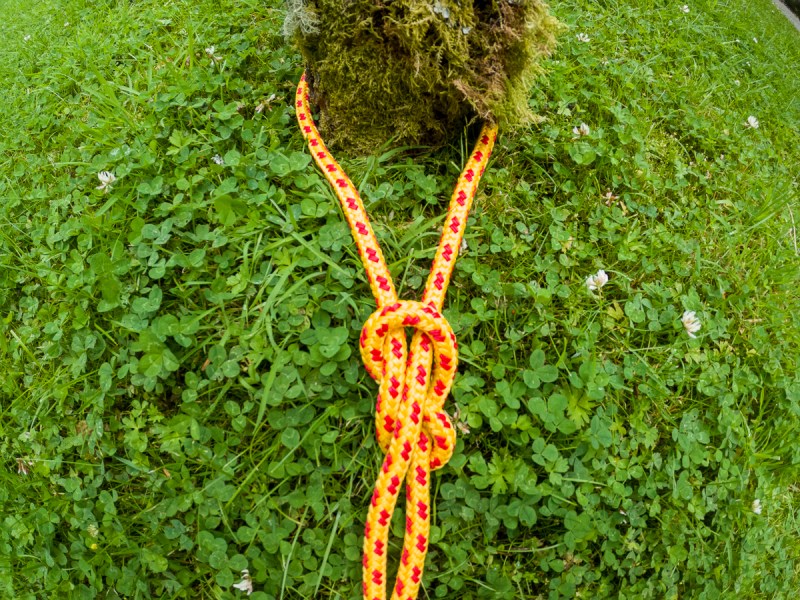 The start of rethreading a figure eight knot in yellow and red rope