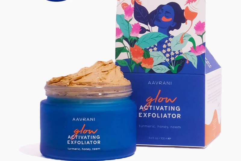 A jar of Aavrani Glow Activating Exfoliator with its box.