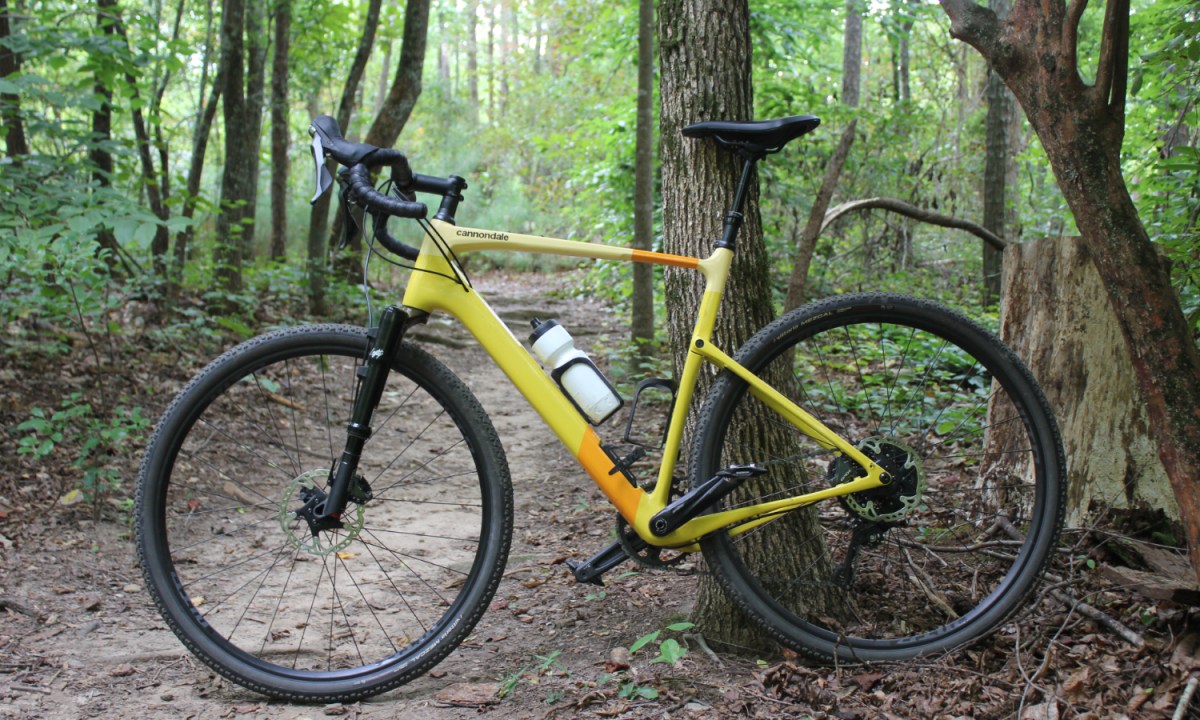 The 2022 Cannondale Topstone Carbon 2 Lefty sitting beside a trail.