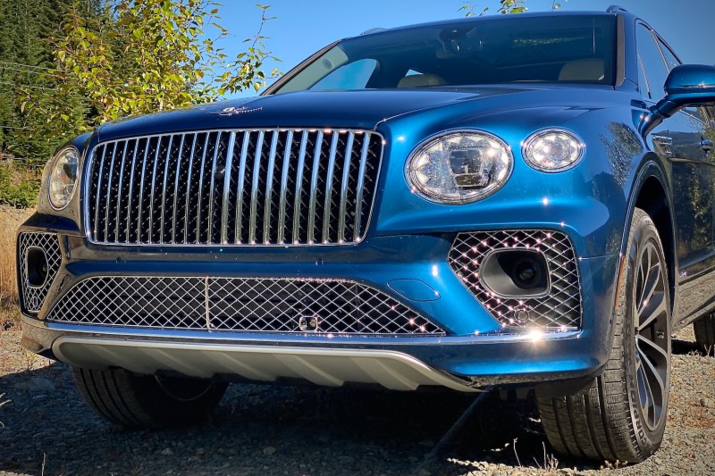 Front end close up of 2023 Bentley Bentayga EWB headlights and new vertical grille.