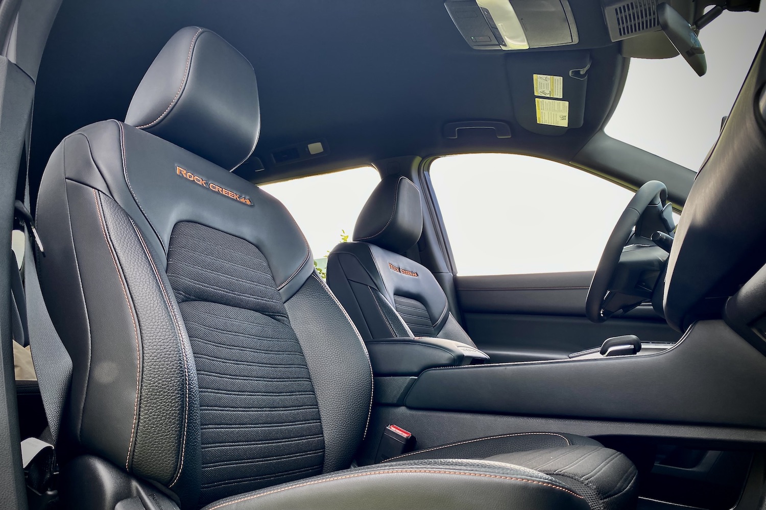 Close up of front passenger seat in the 2023 Nissan Pathfinder Rock Creek.