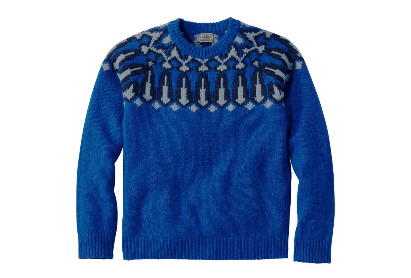 A blue wool sweater with a yoke fair isle pattern.