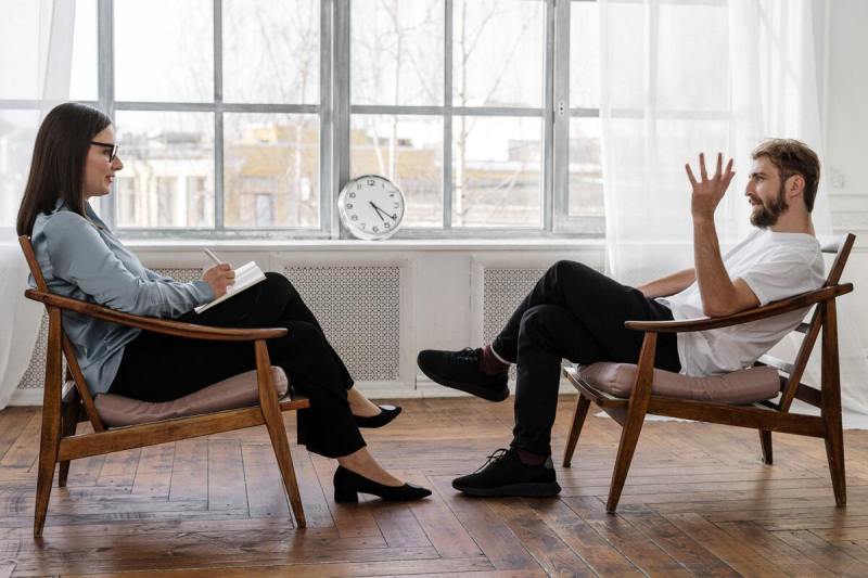 Man talking to therapist.