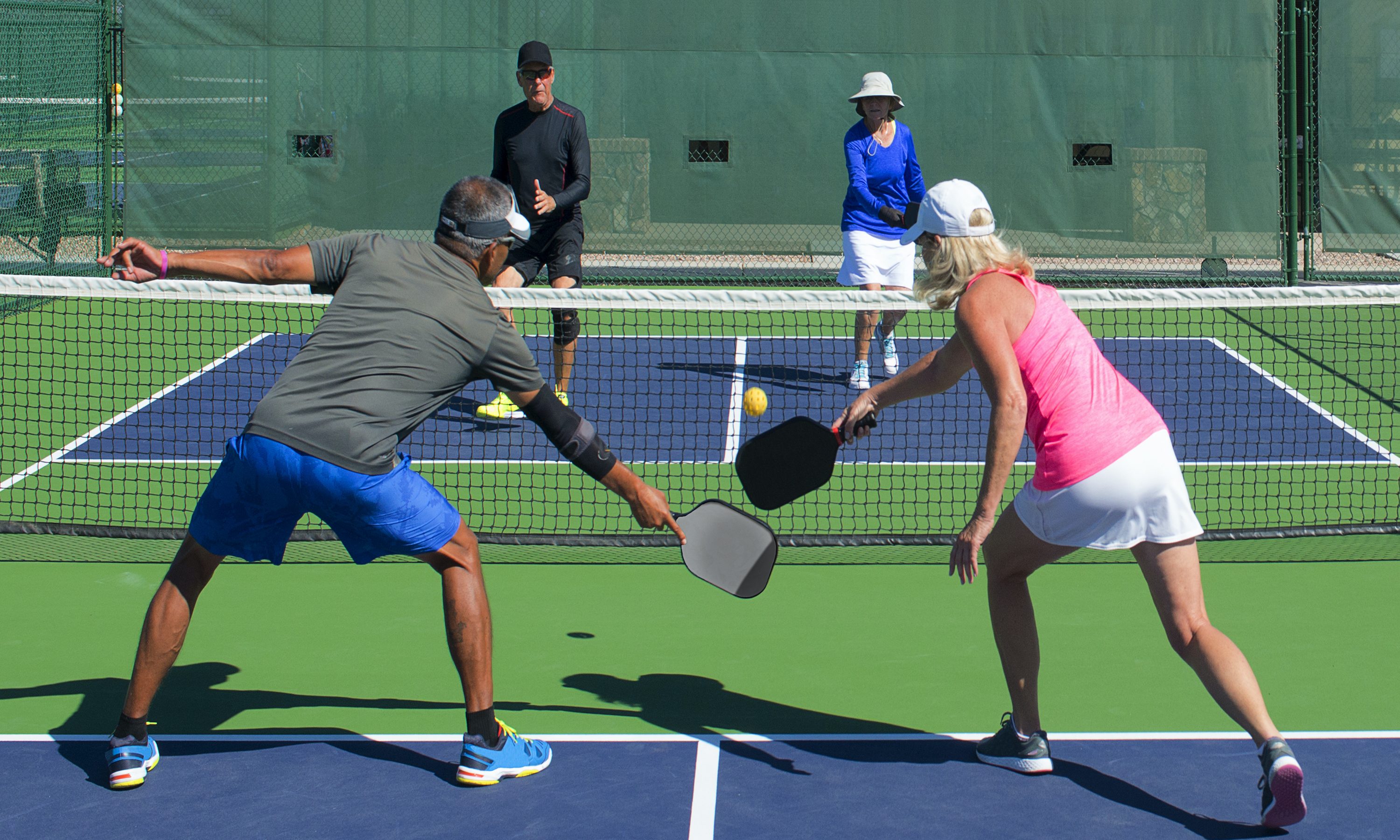 Group playing pickleball