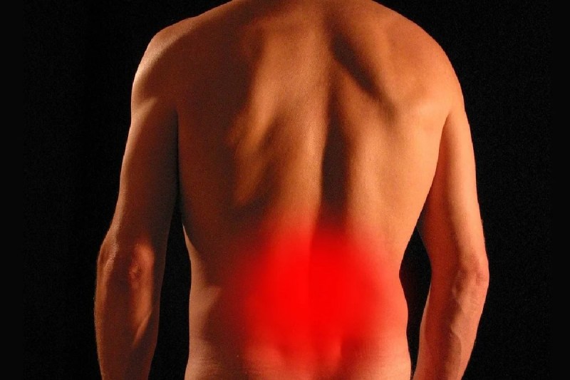 Sciatica pain radiating down back.