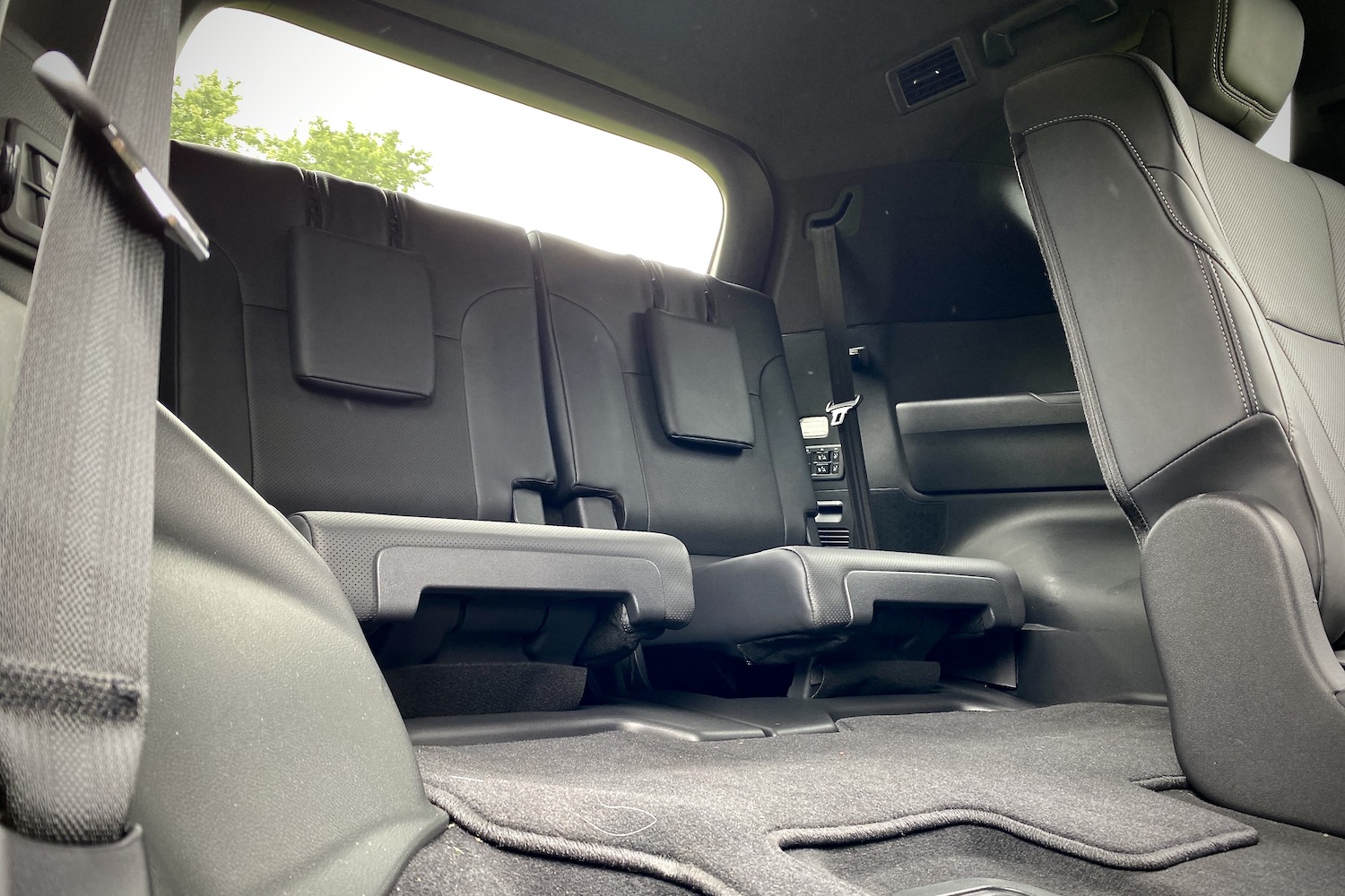 Close up of third-row seats in the 2022 Lexus LX 600 from the passenger side outside of the SUV.