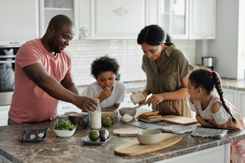 Middle class family cooking together