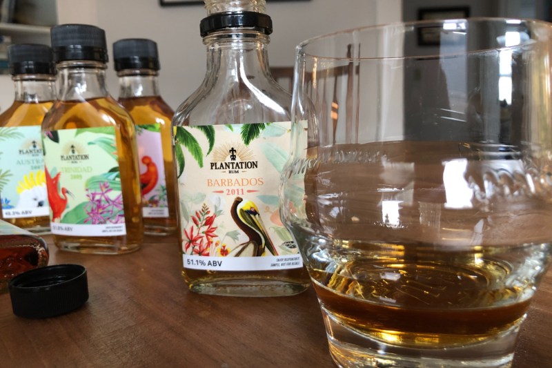 A set of Plantation rums on a table.