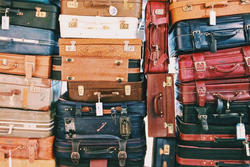 Tall stacks of suitcases.