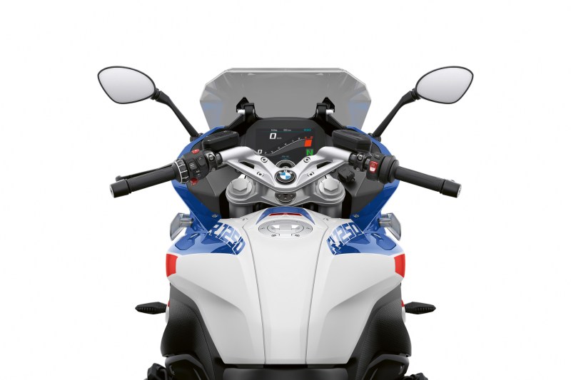 2023 BMW R 1250 RS from the rider's seat with a close up view of the handlebars and windscreen.