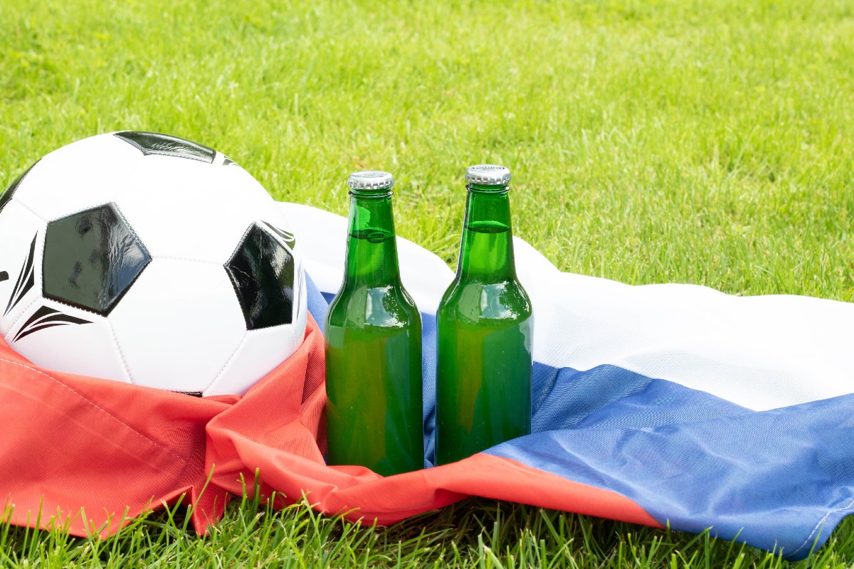 Beer bottles and a soccer ball.