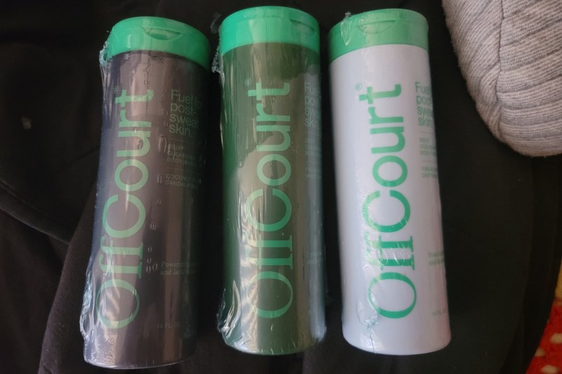 A group of bottles of OffCourt Deep Cleansing Body Wash.