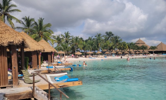 A cluster of private cabanas overlook Iguana Beach at Renaissance Island in Aruba.