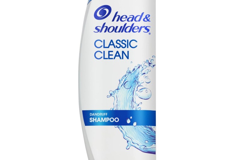A close-up of a bottle of Head & Shoulders Anti-Dandruff Shampoo, Classic Clean.
