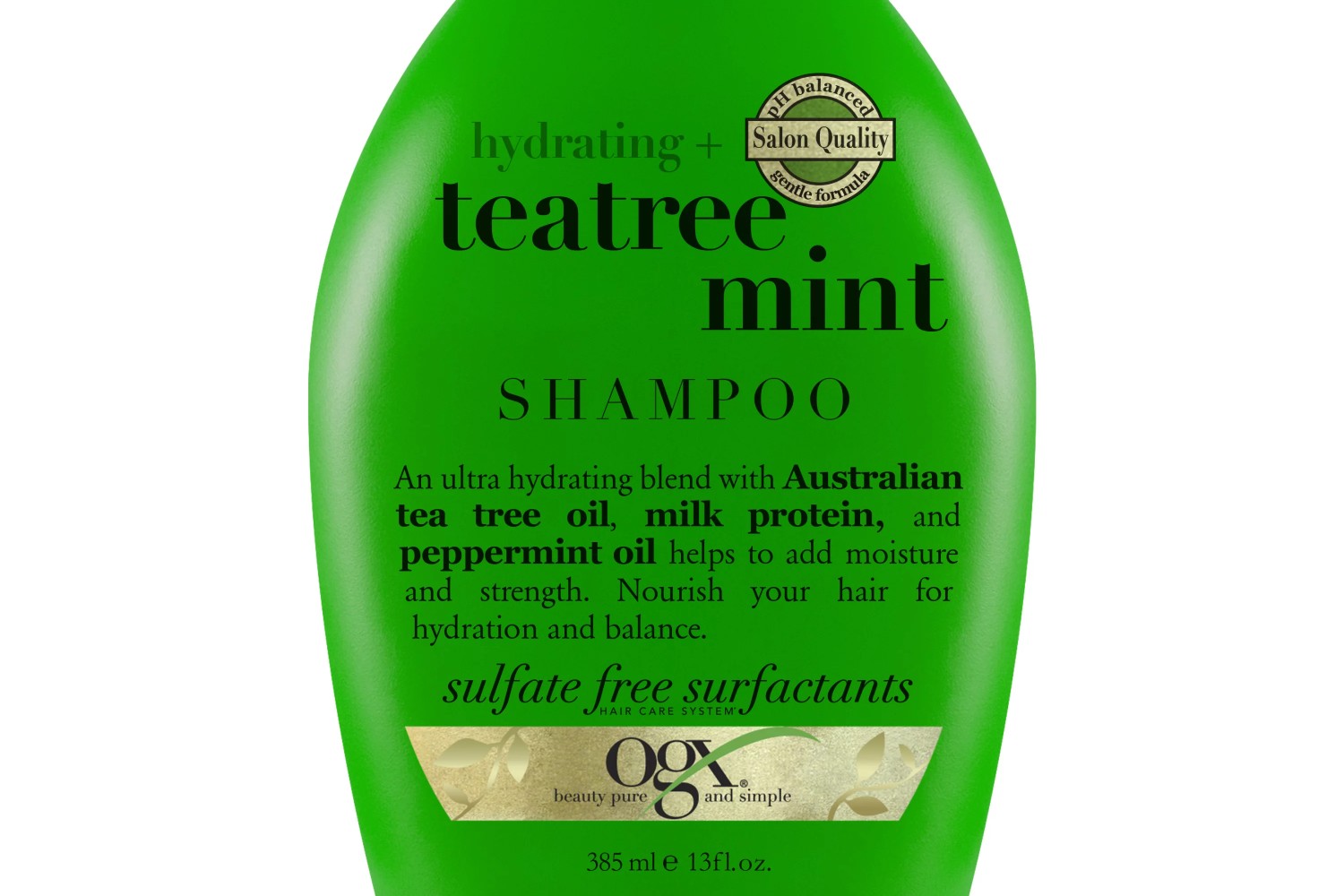 A close-up of a bottle of OGX Hydrating + Tea Tree Mint Nourishing & Invigorating Daily Shampoo.