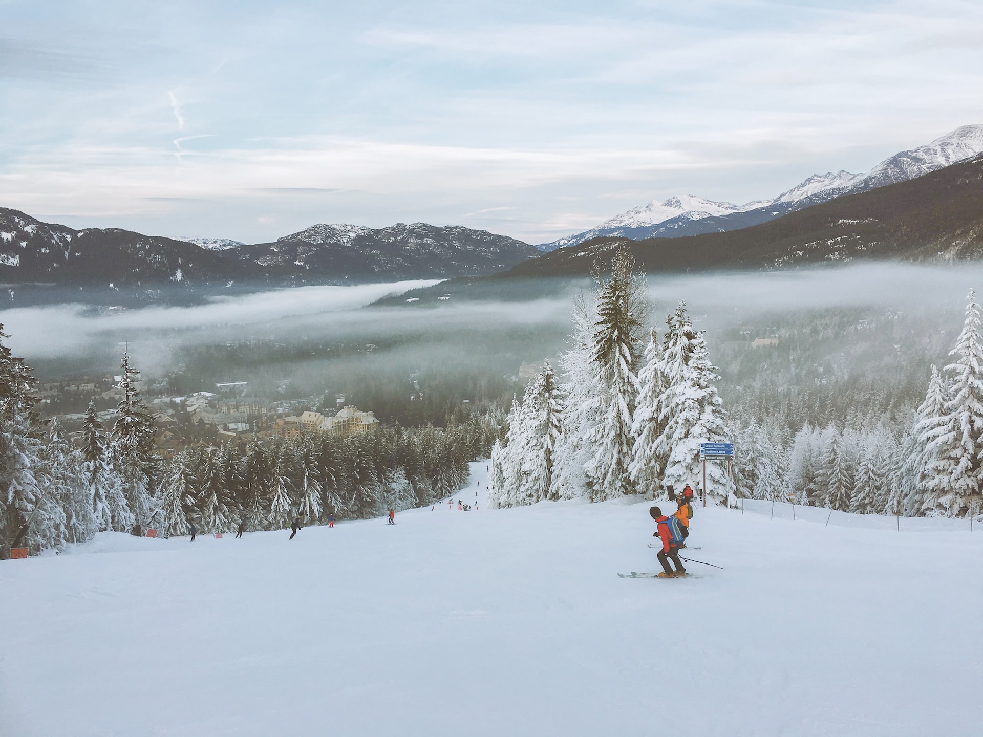 Two skiers at Whistler Blackcomb ski resort.