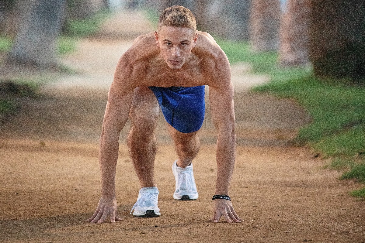 man exercising on a trail