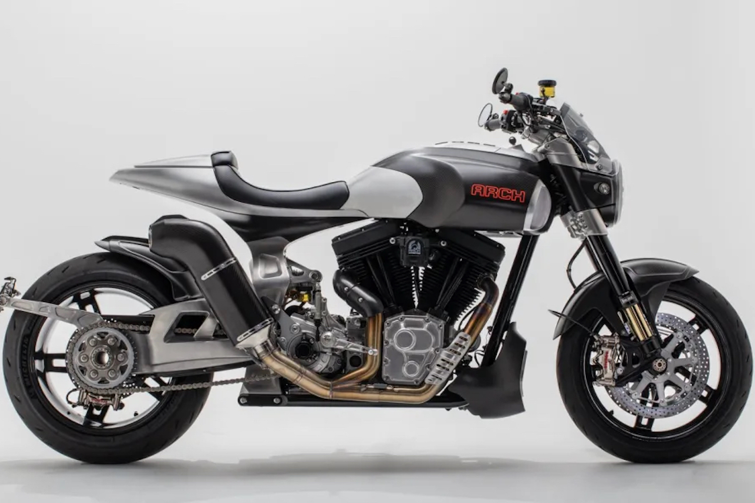 Side profile of Arch Motorcycle 1s in front of a gray background.