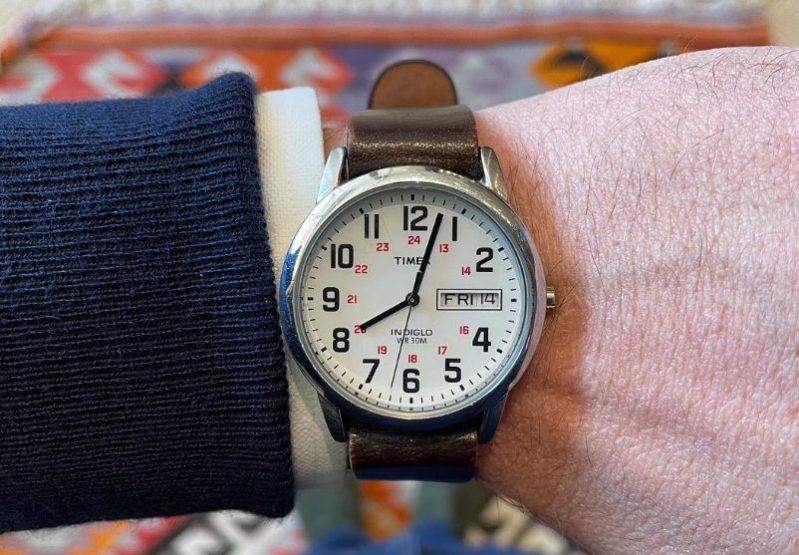 Overhead view of a Timex watch on a wrist.