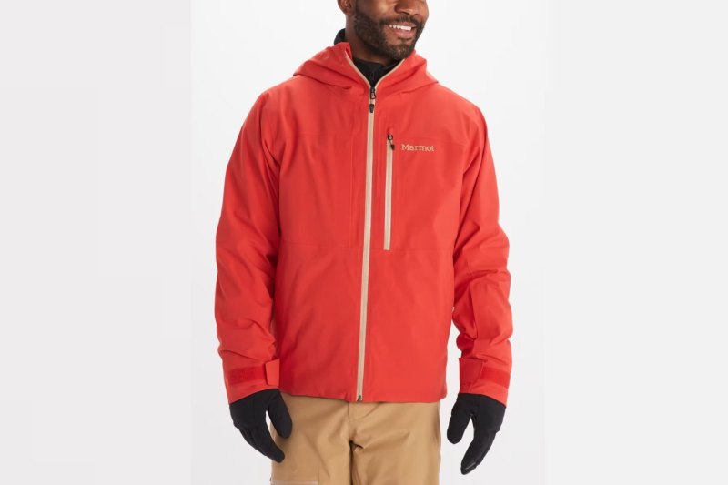 Man wearing Marmot Men's Refuge Jacket on a plain studio background.