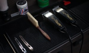 men's grooming tools on black background