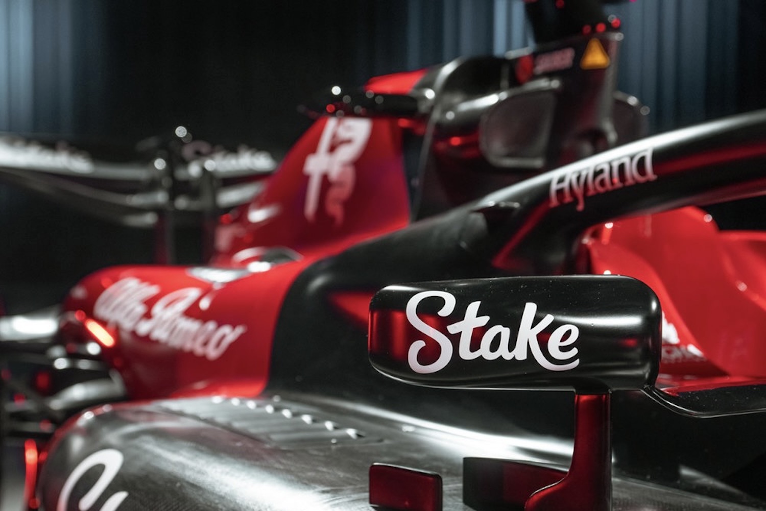 2023 Alfa Romeo F1 C43 close up of side of the show car and front mirror.