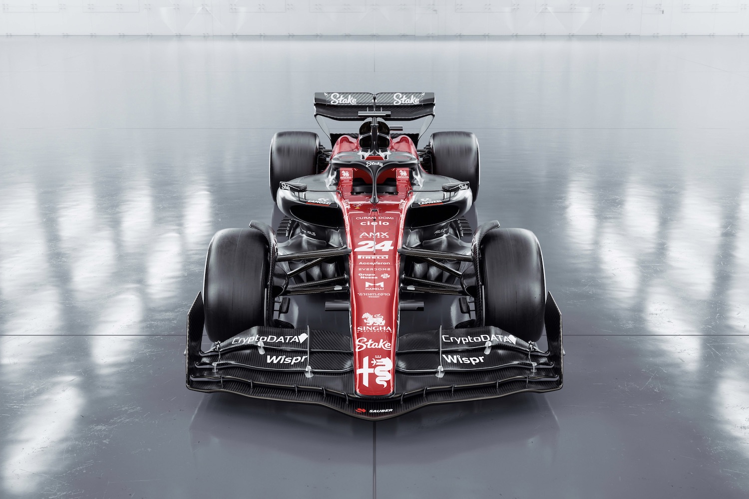 Overhead shot of the front end of the 2023 Alfa Romeo F1 C43 show car parked in a studio with studio lighting.