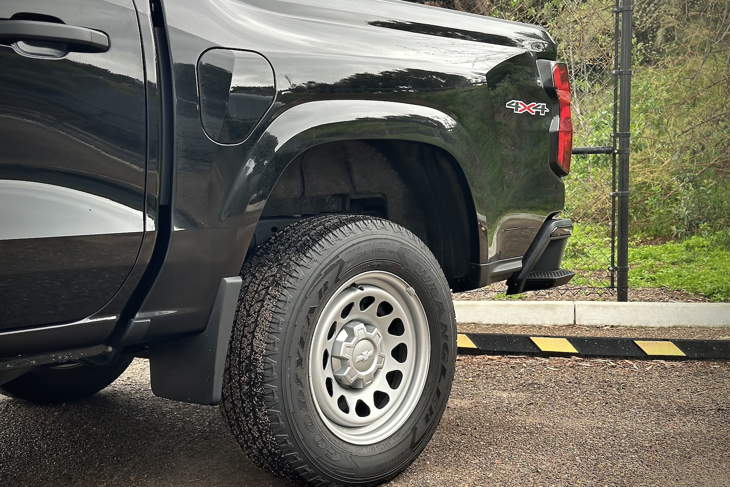 2023 Chevrolet Colorado rear end close of up rear wheel and back of truck.