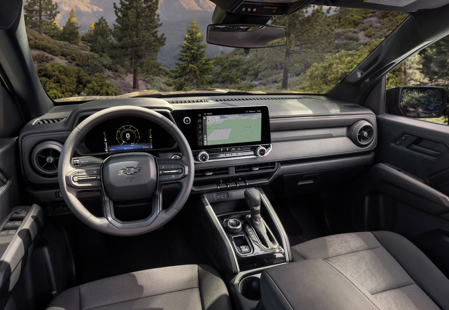 2023 Chevrolet Colorado Interior on the Trail Boss with trees in the back ground.