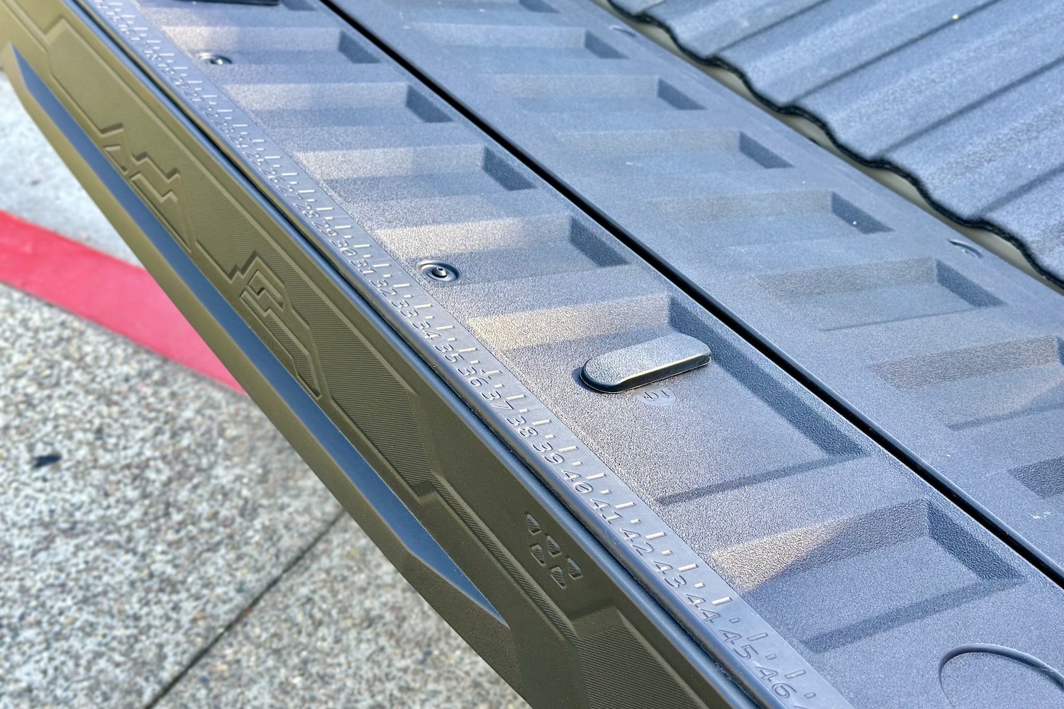 Close up of the ruler on the tailgate on the 2023 Chevrolet Colorado Trail Boss.