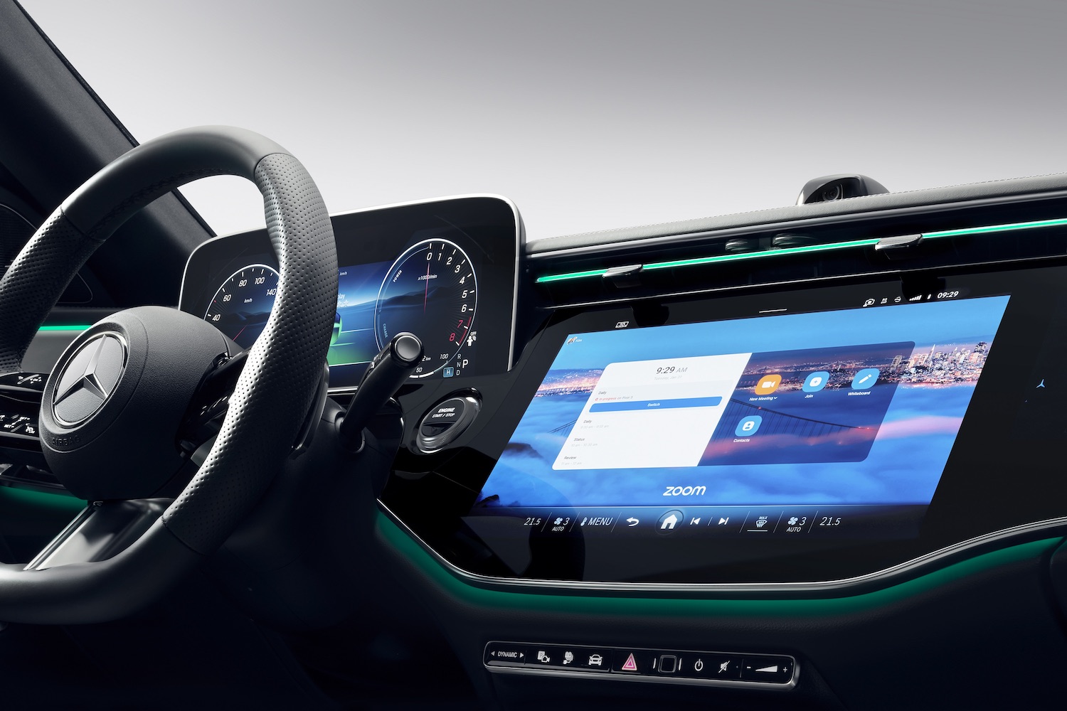 Close up of central screen in the 2024 Mercedes-Benz E-Class Superscreen with green light.