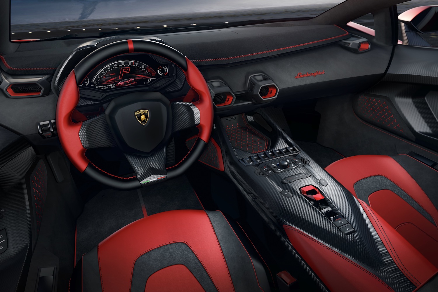 Close up of steering wheel and dashboard in the Lamborghini Invencible with dark clouds in the back.