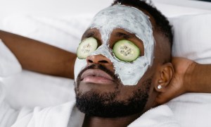 man receiving a facial