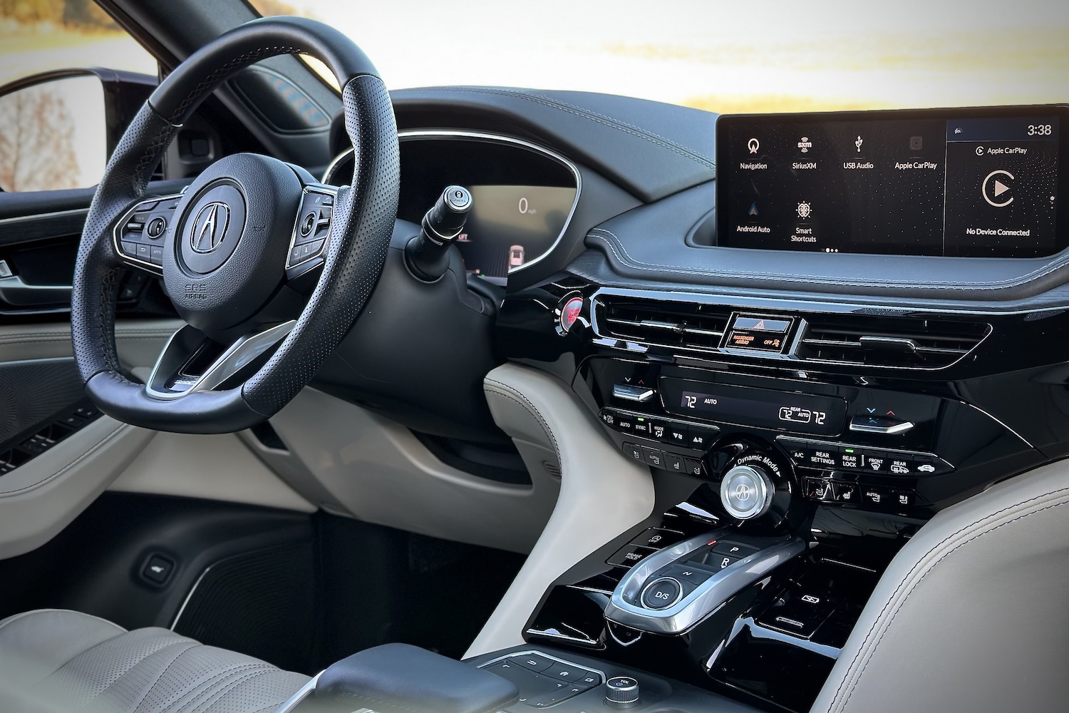 Close up of dashboard and steering wheel in the 2022 Acura MDX Type S from the front seat.