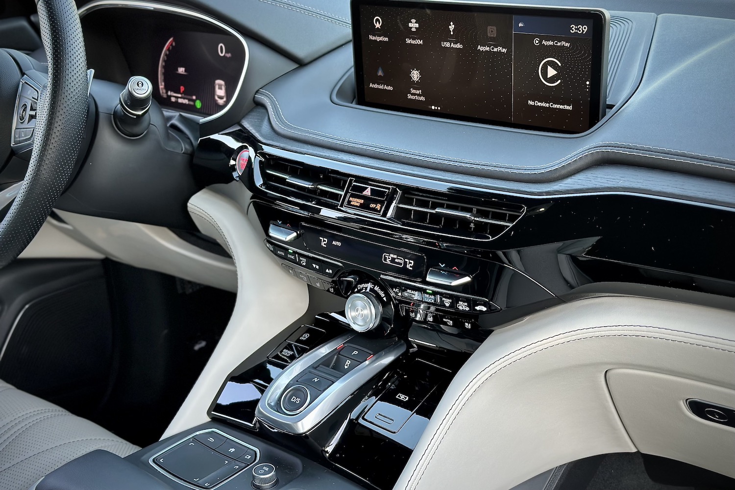 Close up of center console in the 2022 Acura MDX Type S from the passenger's seat.