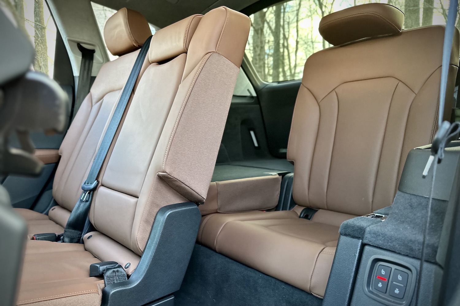 Third-row seats in the 2022 Audi Q7 Prestige from outside the vehicle with the second-row seats folded.