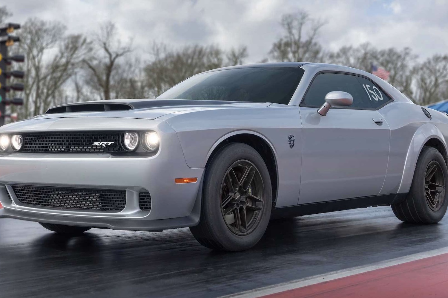 2023 Dodge Challenger SRT Demon 170 front end angle from driver's side on a drag strip.