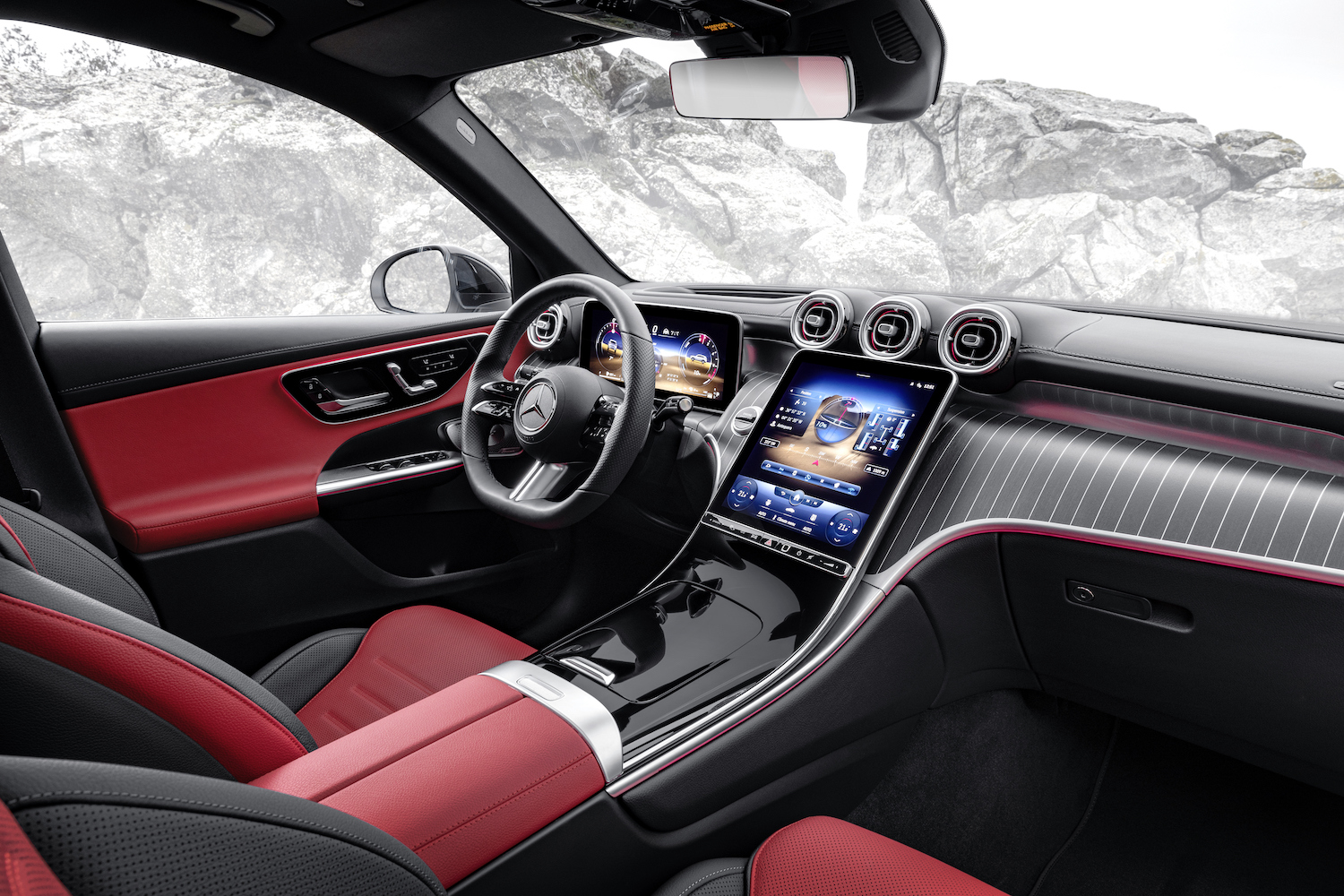 Close up of dashboard in the 2023 Mercedes-Benz GLC parked in front of mountains.